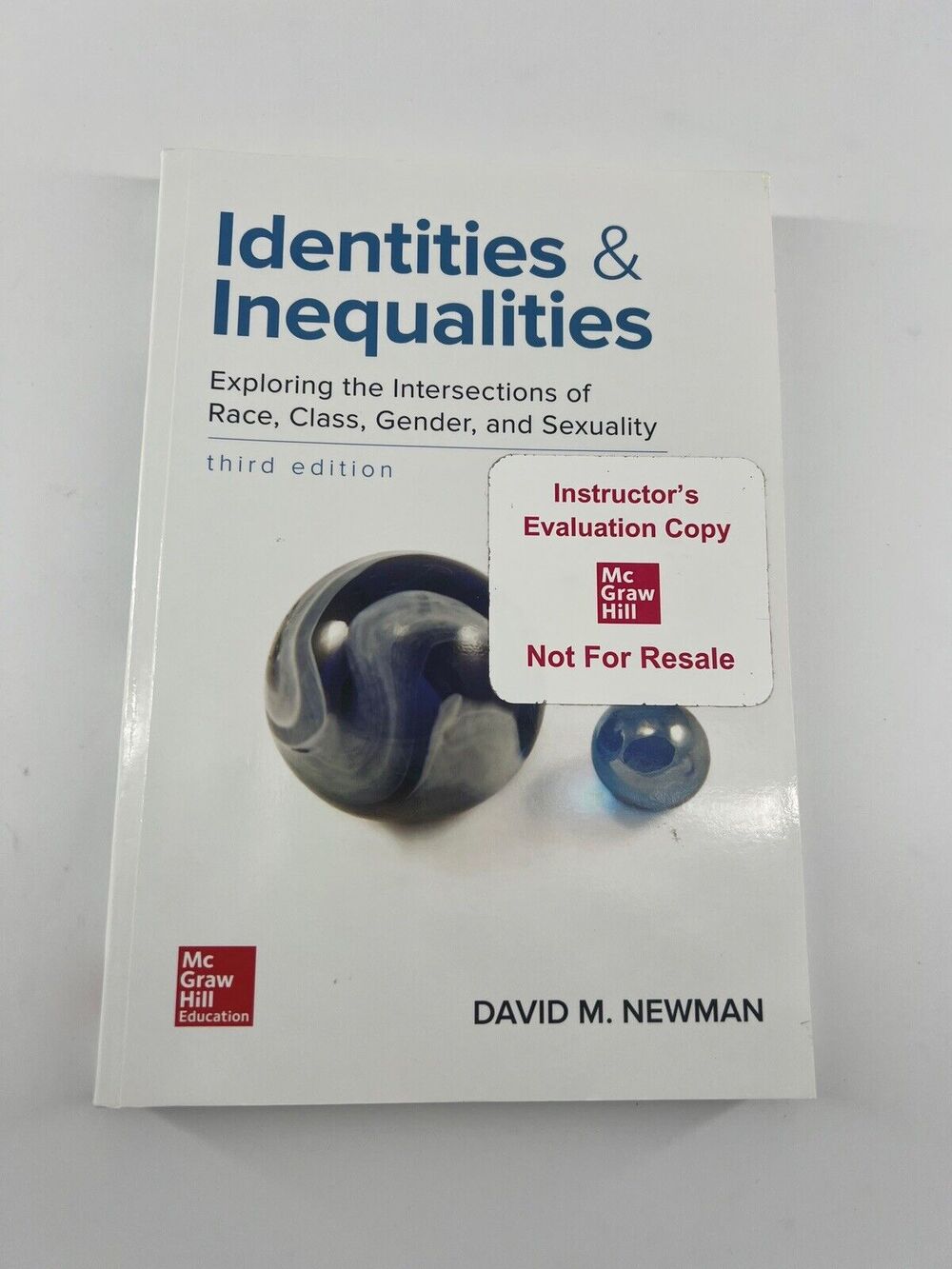 Identities and Inequalities: Exploring the Intersections of Race by David Newman